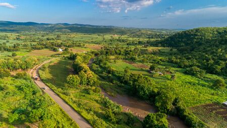 Aerial view of endless lush pastures and farmlands of morogoro town, Tanzaniaの写真素材