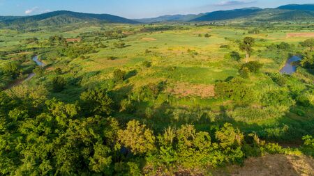 Aerial view of endless lush pastures and farmlands of morogoro town, Tanzaniaの写真素材