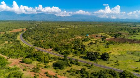 Aerial view of endless lush pastures and farmlands of morogoro town, Tanzaniaの写真素材