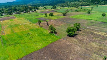 Aerial view of endless lush pastures and farmlands of morogoro town, Tanzaniaの写真素材