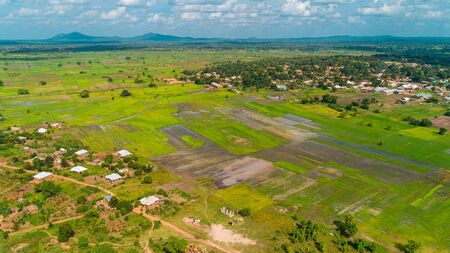 Aerial view of endless lush pastures and farmlands of morogoro town, Tanzaniaの写真素材