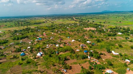 Aerial view of endless lush pastures and farmlands of morogoro town, Tanzaniaの写真素材