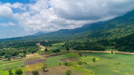 Aerial view of endless lush pastures and farmlands of morogoro town, Tanzaniaの写真素材