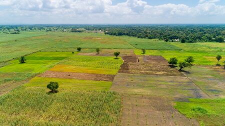 Aerial view of endless lush pastures and farmlands of morogoro town, Tanzaniaの写真素材