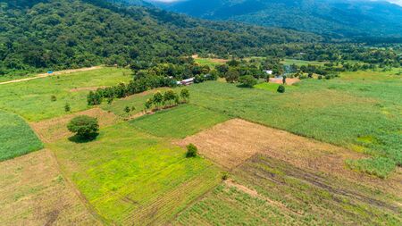 Aerial view of endless lush pastures and farmlands of morogoro town, Tanzaniaの写真素材