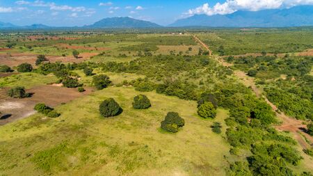 Aerial view of endless lush pastures and farmlands of morogoro town, Tanzaniaの写真素材