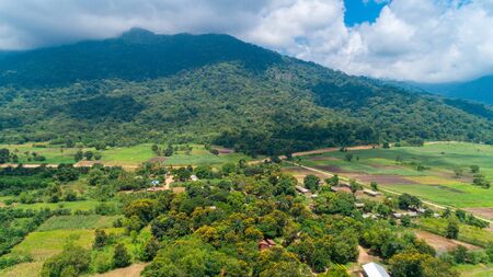 Aerial view of endless lush pastures and farmlands of morogoro town, Tanzaniaの写真素材