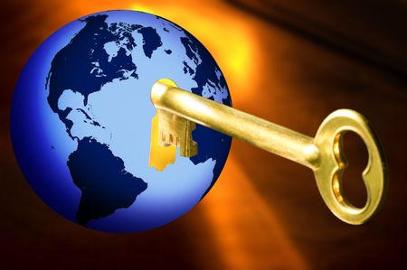 Golden key opening blue globe with world mapの写真素材