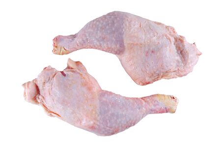 Raw chicken legs isolated on white backgroundの写真素材