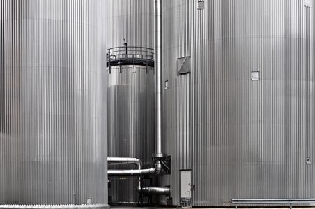 Cylindrical corrugated steel silo at a biomass power plantの写真素材