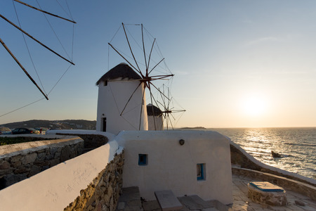 Sunset at White windmill on the island of Mykonos Cycladesの写真素材