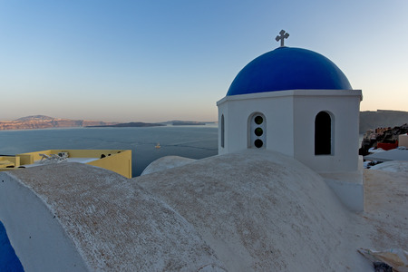 White Church in Town of Oia Santorini Tira Island Cycladesの写真素材