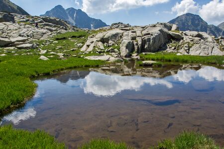Amazing panorama of the Yalovarnika and The Tooth peaks in Pirin Mountain, Bulgariaの写真素材