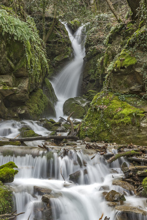 Amazing view of  Leshnishki Waterfall in deep forest, Belasitsa Mountain, Bulgariaの写真素材