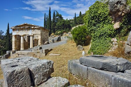 Building of Treasury of Athens in Ancient Greek archaeological site of Delphi, Central Greeceの写真素材