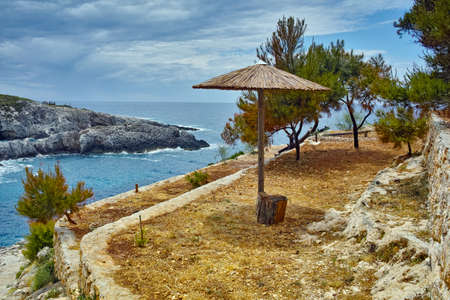 umbrella at Limnionas beach bay in Zakynthos island, Greeceの写真素材