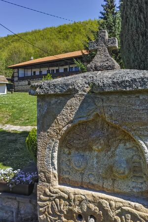 Stone fountain and church in  Temski monastery St. George, Pirot Region, Republic of Serbiaの写真素材