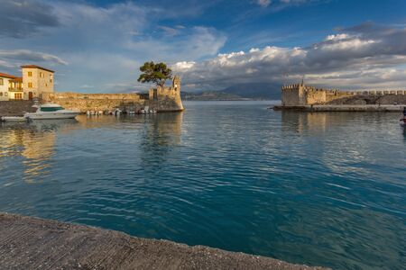 Amazing Sunset of Fortification at the port of Nafpaktos town, Western Greece