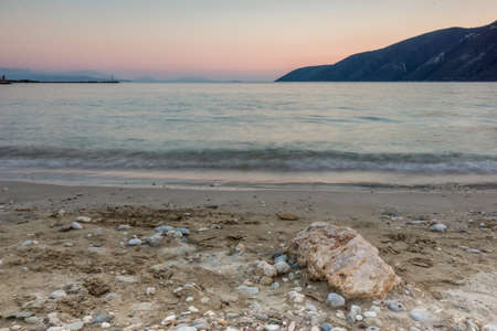Amazing sunset on the beach of village of Vasiliki, Lefkada, Ionian Islands, Greeceの写真素材