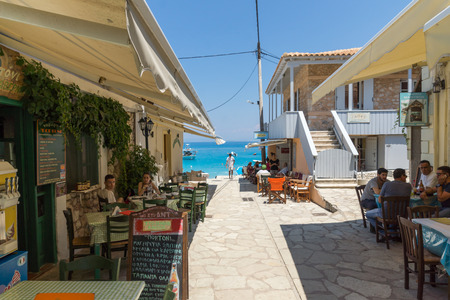 AGIOS NIKITAS, LEFKADA, GREECE JULY 16, 2014: Traditional houses in village of Agios Nikitas, Lefkada, Ionian Islands, Greeceのeditorial素材