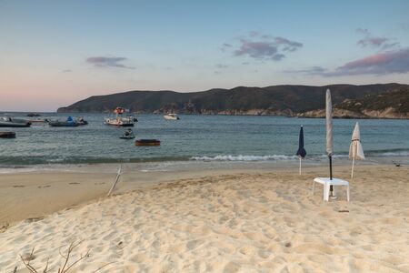 CHALKIDIKI, CENTRAL MACEDONIA, GREECE - AUGUST 26, 2014: Sunset view of Kalamitsi Beach at Sithonia peninsula, Chalkidiki, Central Macedonia, Greeceのeditorial素材