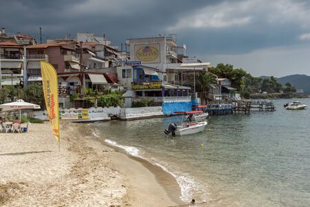 CHALKIDIKI, CENTRAL MACEDONIA, GREECE - AUGUST 25, 2014: Panorama of Coastline of town of Neos Marmaras at Sithonia peninsula, Chalkidiki, Central Macedonia, Greeceのeditorial素材