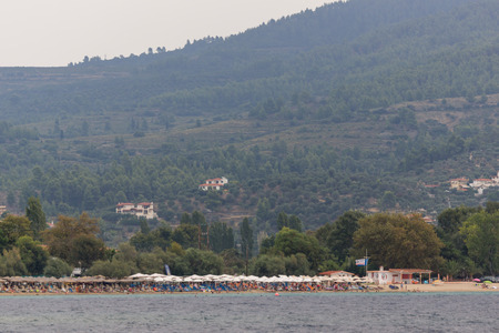 CHALKIDIKI, CENTRAL MACEDONIA, GREECE - AUGUST 25, 2014: Panorama of Coastline of town of Neos Marmaras at Sithonia peninsula, Chalkidiki, Central Macedonia, Greeceのeditorial素材