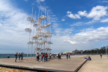 THESSALONIKI, GREECE - SEPTEMBER 30, 2017: People under Umbrellas sculpture in of of city of Thessaloniki, Central Macedonia, Greeceのeditorial素材