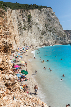 PORTO KATSIKI BEACH, LEFKADA, GREECE - JULY 16, 2014: People visiting Porto Katsiki Beach with blue waters, Lefkada, Ionian Islands, Greeceのeditorial素材