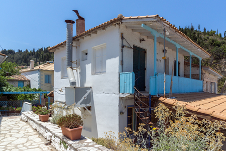 AGIOS NIKITAS, LEFKADA, GREECE - JULY 16, 2014: Traditional houses in village of Agios Nikitas, Lefkada, Ionian Islands, Greeceのeditorial素材