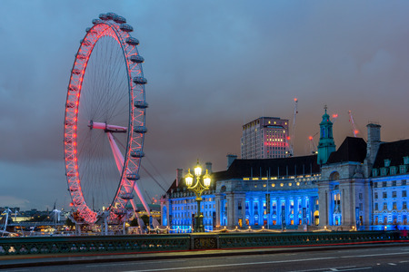 LONDON, ENGLAND - JUNE 16 2016: Night photo of The London Eye and County Hall from Westminster bridge, London, England, Great Britainのeditorial素材