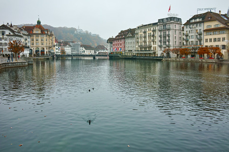 LUCERNE, SWITZERLAND - OCTOBER 28, 2015: The Reuss River River passes through the historic center of City of Luzern, Switzerlandのeditorial素材