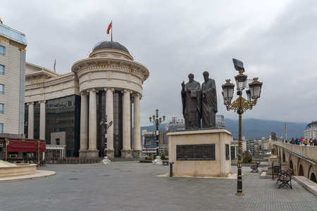 SKOPJE, REPUBLIC OF MACEDONIA - FEBRUARY 24, 2018:  Monument of St. Cyril and Methodius and Archaeological Museum in city of  Skopje, Republic of Macedoniaのeditorial素材