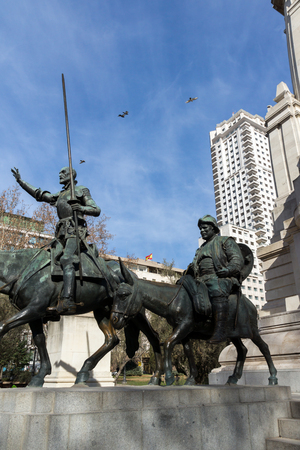 MADRID, SPAIN - JANUARY 23, 2018:   Monument to Cervantes and Don Quixote and Sancho Panza at Spain Square in City of Madrid, Spainのeditorial素材