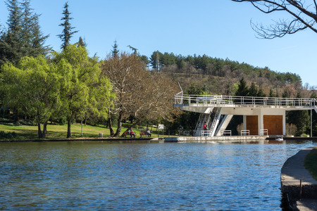 SANDANSKI, BULGARIA - APRIL 4, 2018: Spring view of lake in park St. Vrach in town of Sandanski, Bulgariaのeditorial素材