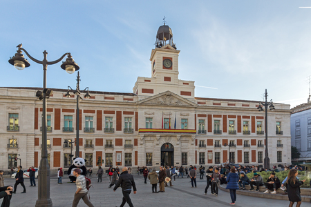MADRID, SPAIN - JANUARY 23, 2018:  Sunset view of walking people at Puerta del Sol in Madrid, Spainのeditorial素材