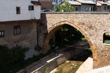 KRATOVO, MACEDONIA - JULY 21, 2018: Old Medieval Bridge at the center of town of Kratovo, Republic of Macedoniaのeditorial素材
