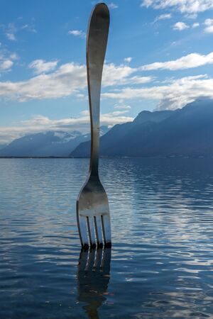 VEVEY, SWITZERLAND - OCTOBER 29, 2015 : Lake Geneva and Embankment of town of Vevey, canton of Vaud, Switzerlandのeditorial素材
