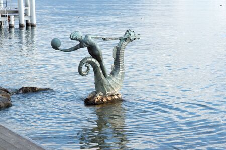 VEVEY, SWITZERLAND - OCTOBER 29, 2015 : Lake Geneva and Embankment of town of Vevey, canton of Vaud, Switzerlandのeditorial素材