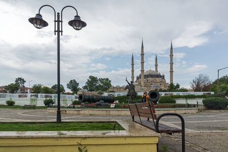 EDIRNE, TURKEY - MAY 26, 2018:  Selimiye Mosque and monument of Ottoman Sultan Mehmed II with medieval cannon in city of Edirne,  East Thrace, Turkeyのeditorial素材