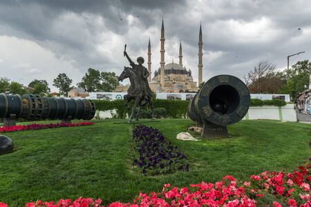 EDIRNE, TURKEY - MAY 26, 2018:  Selimiye Mosque and monument of Ottoman Sultan Mehmed II with medieval cannon in city of Edirne,  East Thrace, Turkeyのeditorial素材
