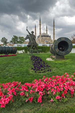 EDIRNE, TURKEY - MAY 26, 2018:  Selimiye Mosque and monument of Ottoman Sultan Mehmed II with medieval cannon in city of Edirne,  East Thrace, Turkeyのeditorial素材