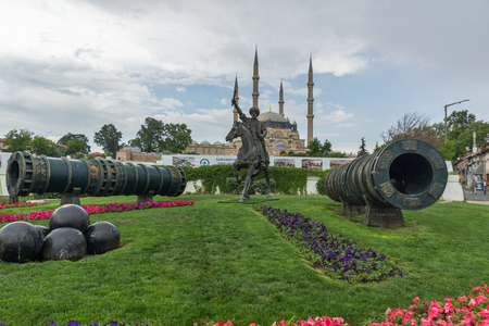 EDIRNE, TURKEY - MAY 26, 2018:  Selimiye Mosque and monument of Ottoman Sultan Mehmed II with medieval cannon in city of Edirne,  East Thrace, Turkeyのeditorial素材