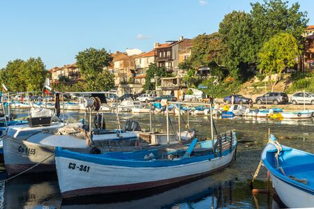 SOZOPOL, BULGARIA - AUGUST 9, 2018: Sunset seascape with Boat at port of Sozopol, Burgas Region, Bulgariaのeditorial素材