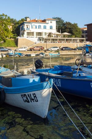 SOZOPOL, BULGARIA - AUGUST 9, 2018: Sunset seascape with Boat at port of Sozopol, Burgas Region, Bulgariaのeditorial素材