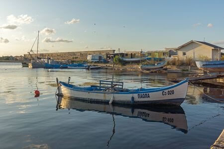 SOZOPOL, BULGARIA - AUGUST 9, 2018: Sunset view with Boat at port of Sozopol, Burgas Region,...