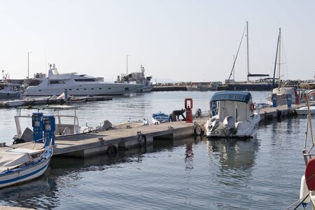 NEA MOUDANIA, GREECE - MARCH 31, 2019: Coastal street of town of Nea Moudania, Chalkidiki, Central...