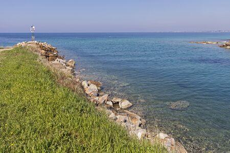 NEA POTEIDAIA, GREECE - MARCH 31, 2019: Coastline of Nea Poteidaia, Kassandra, Chalkidiki, Central Macedonia, Greeceのeditorial素材