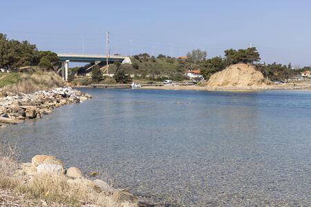 NEA POTEIDAIA, GREECE - MARCH 31, 2019: Canal at town of Nea Poteidaia, Kassandra, Chalkidiki, Central Macedonia, Greeceのeditorial素材