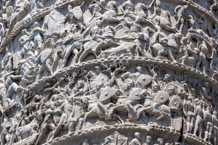 Architectural detail from of ancient Marcus Aurelius Column in front of Palazzo Chigi in city of Rome, Italyのeditorial素材